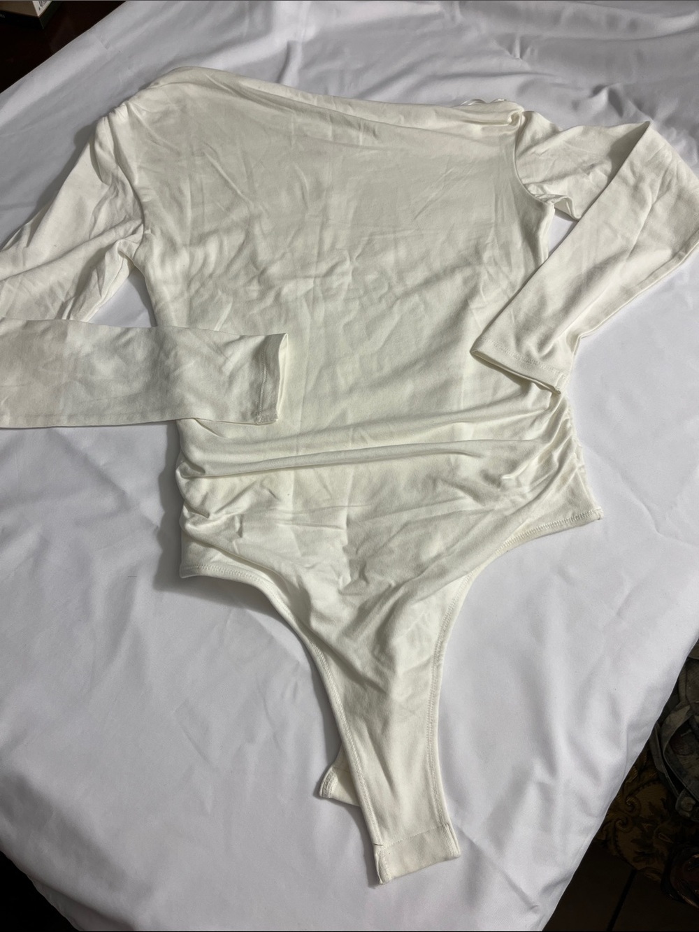 Chelsea & Violet Ivory Long-Sleeve Thong Bodysuit